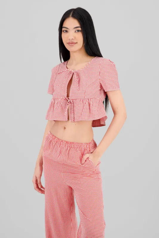 Blusa cuadros moños sold by Shasa