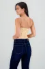 Top tirantes con detalle mini flor sold by Shasa