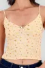 Top tirantes con detalle mini flor sold by Shasa