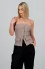 Top formal con bolsas y accentos de botones sold by Shasa
