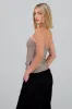 Top formal con bolsas y accentos de botones sold by Shasa