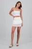 Skort con smock y eyelet sold by Shasa