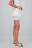 Skort con smock y eyelet sold by Shasa