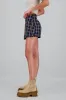 Falda short cuadros tableada sold by Shasa