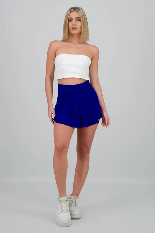 Falda short tableada lisa sold by Shasa