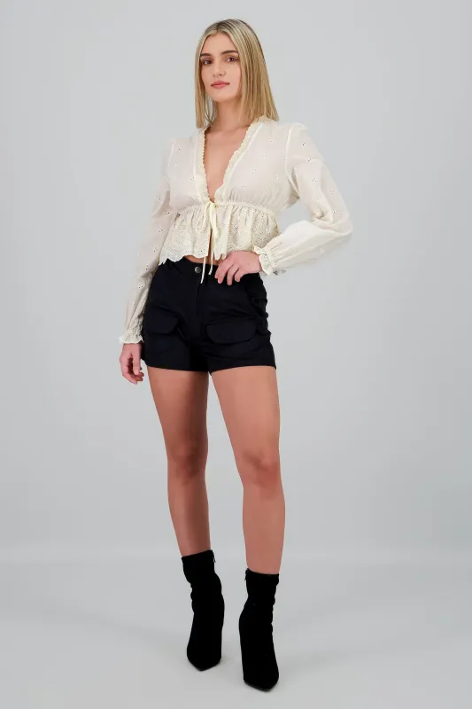 Mini shorts con bolsas liso sold by Shasa