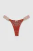 Tanga mesh aros encaje lateral sold by Shasa