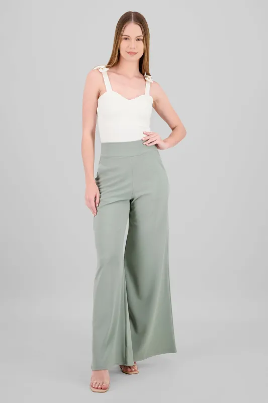 Pantalon liso cierre sold by Shasa