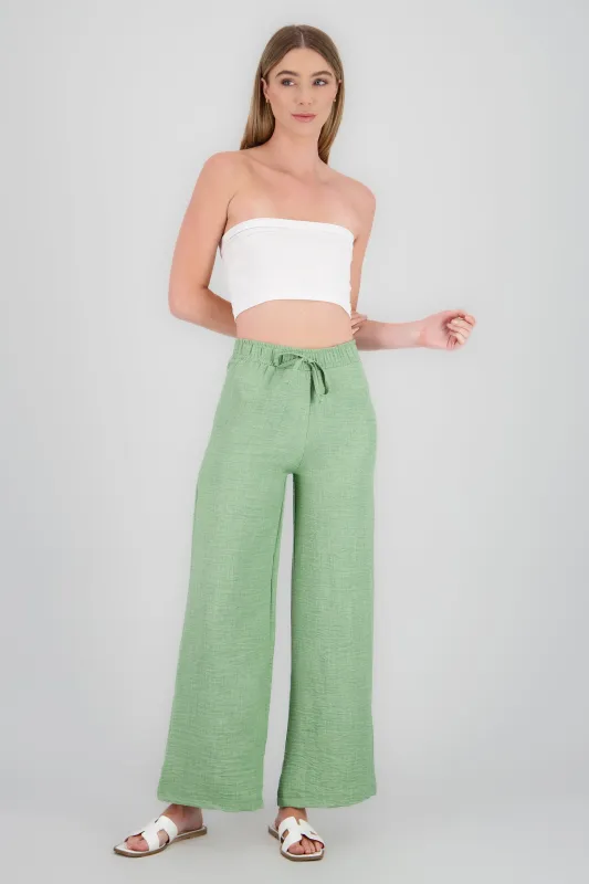 Pantalones amplios jareta sold by Shasa