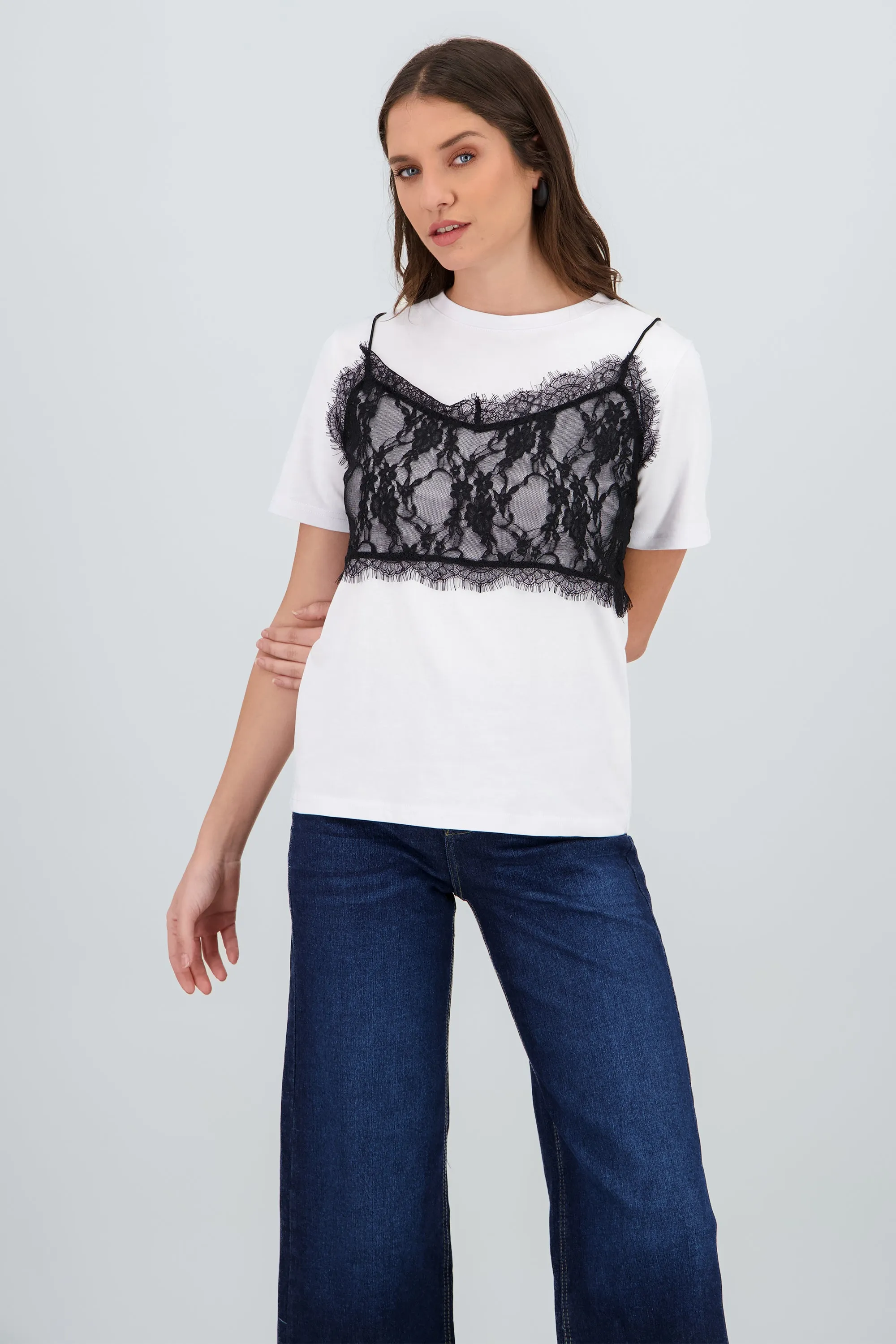 Playera oversized detalle encaje sold by Shasa