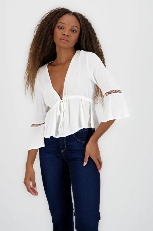 Blusa amarre detalle mangas sold by Shasa