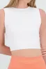 Top crop sin manga cuello redondo liso sold by Shasa