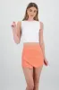 Top crop sin manga cuello redondo liso sold by Shasa