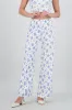 Pantalon amplio textura y flores sold by Shasa