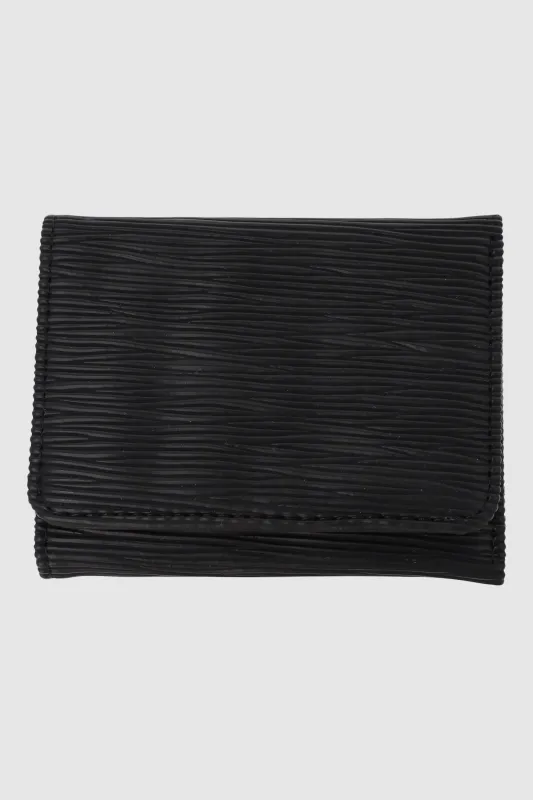 Cartera pequeña textura cebra sold by Shasa