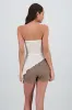 Top asimetrico con textura sold by Shasa