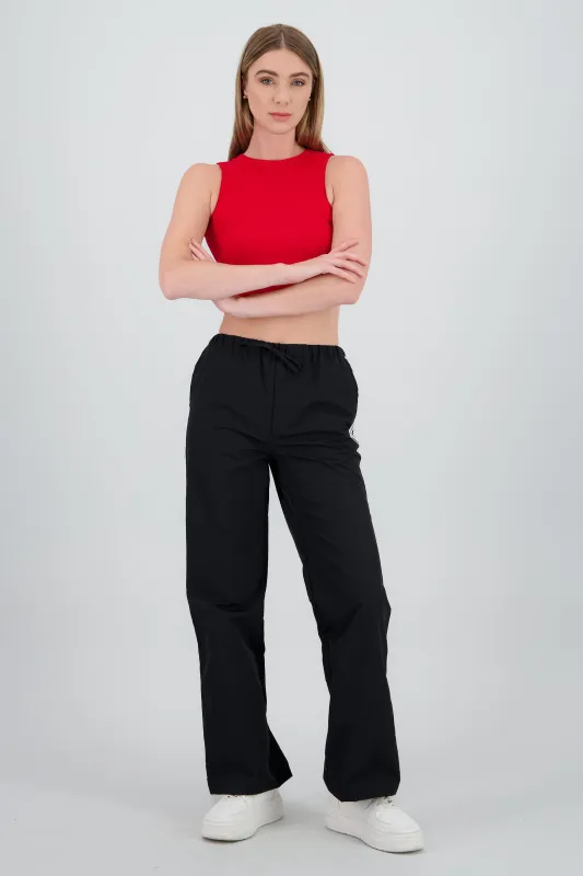 Pantalones lisos rayas nylon sold by Shasa