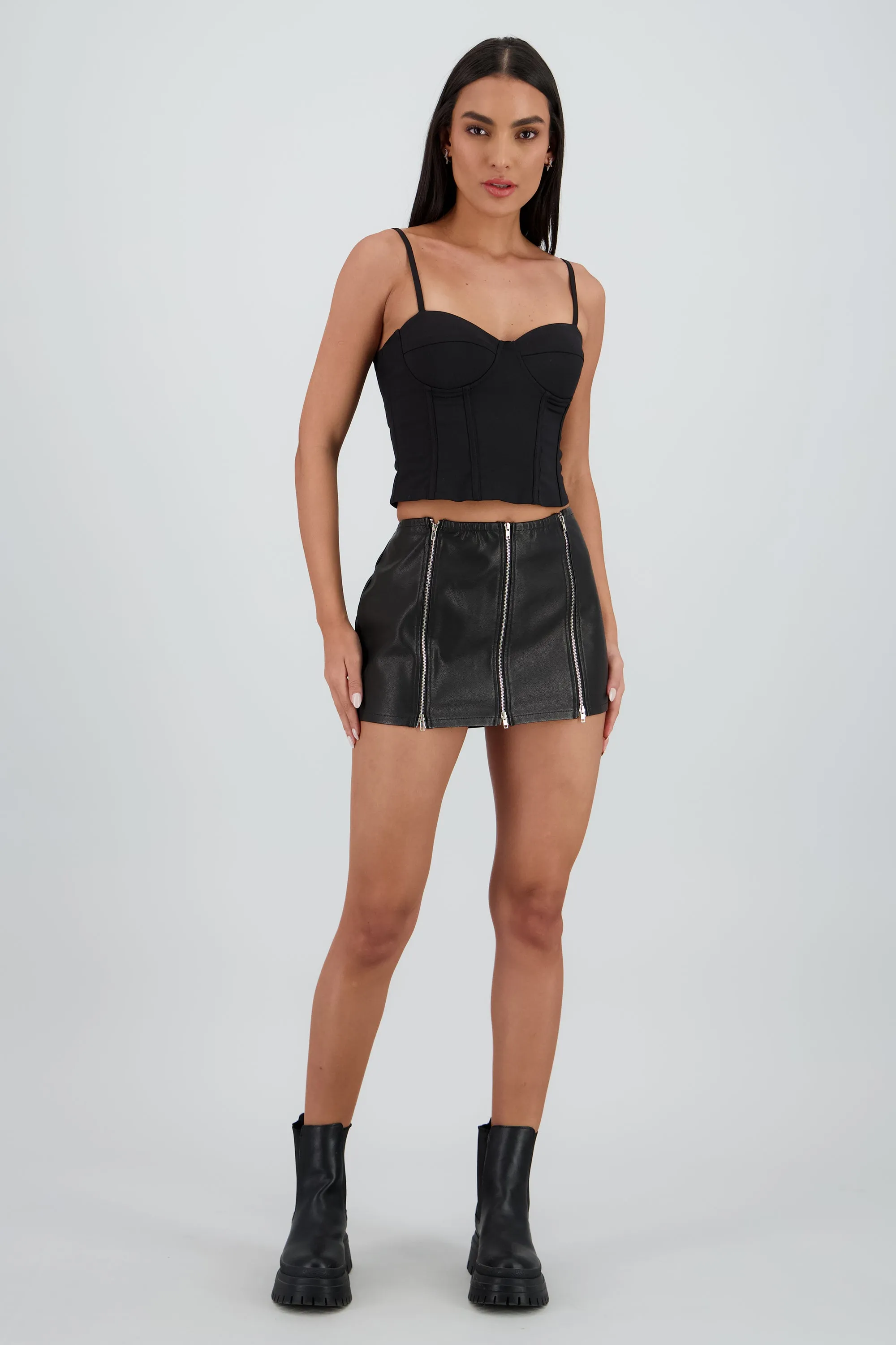 Falda de pu con triple cierre liso sold by Shasa