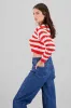 Sueter con rayas cuello en V sold by Shasa