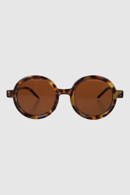 Lente redondo marco en contraste sold by Shasa