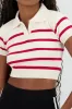 Top tejido cuello polo rayas sold by Shasa