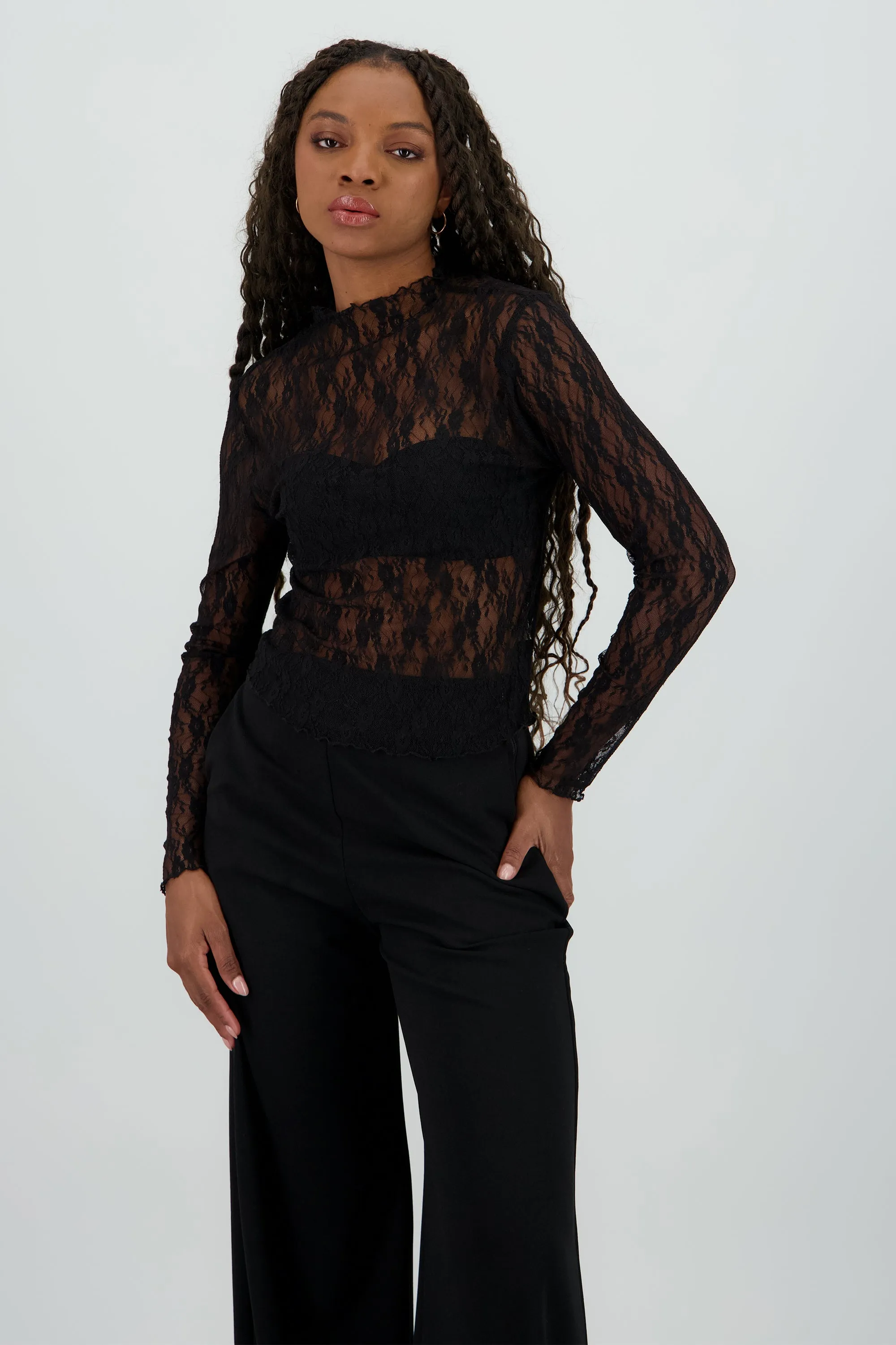 Top manga larga encaje sold by Shasa