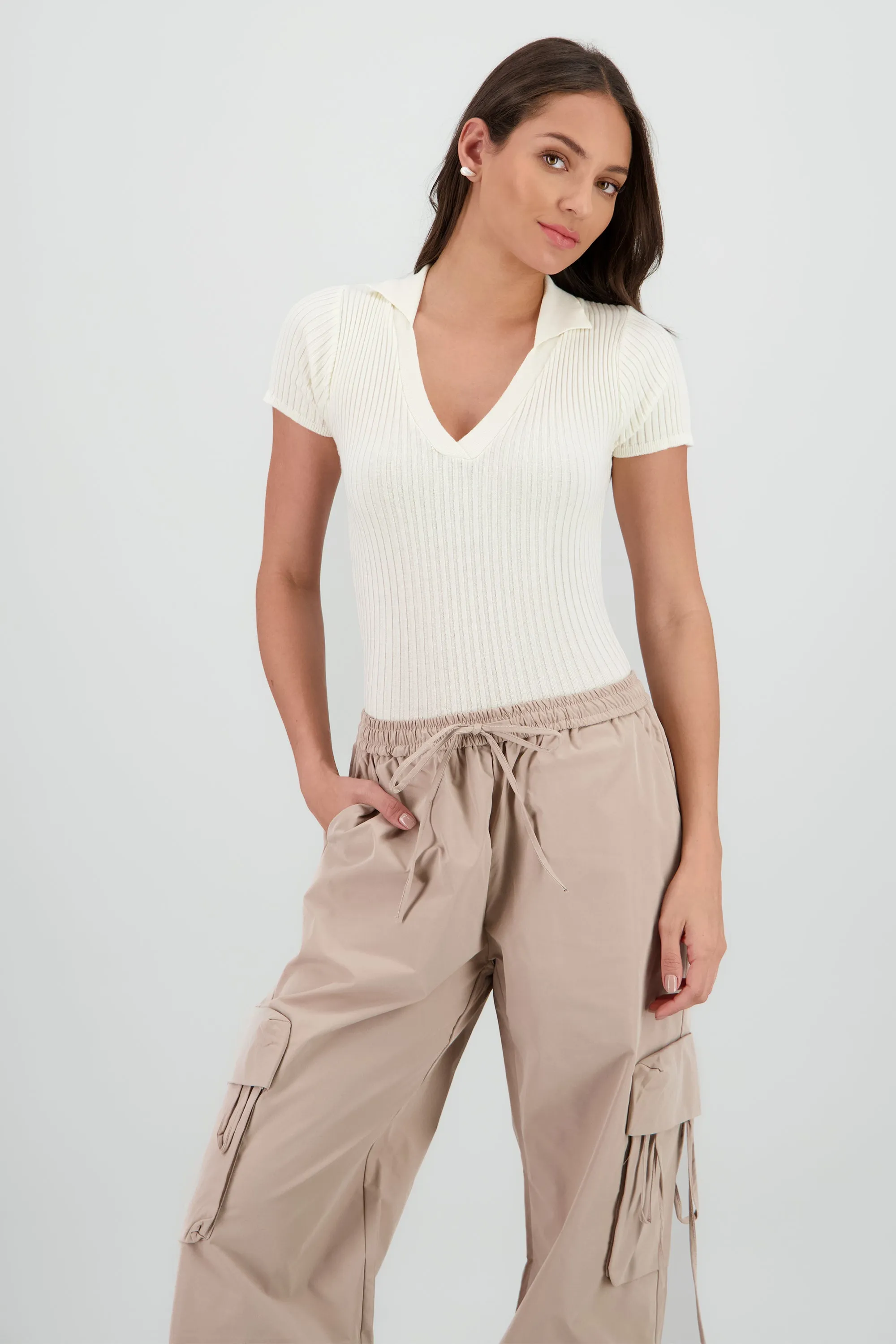 Bodysuit tejido cuello polo sold by Shasa