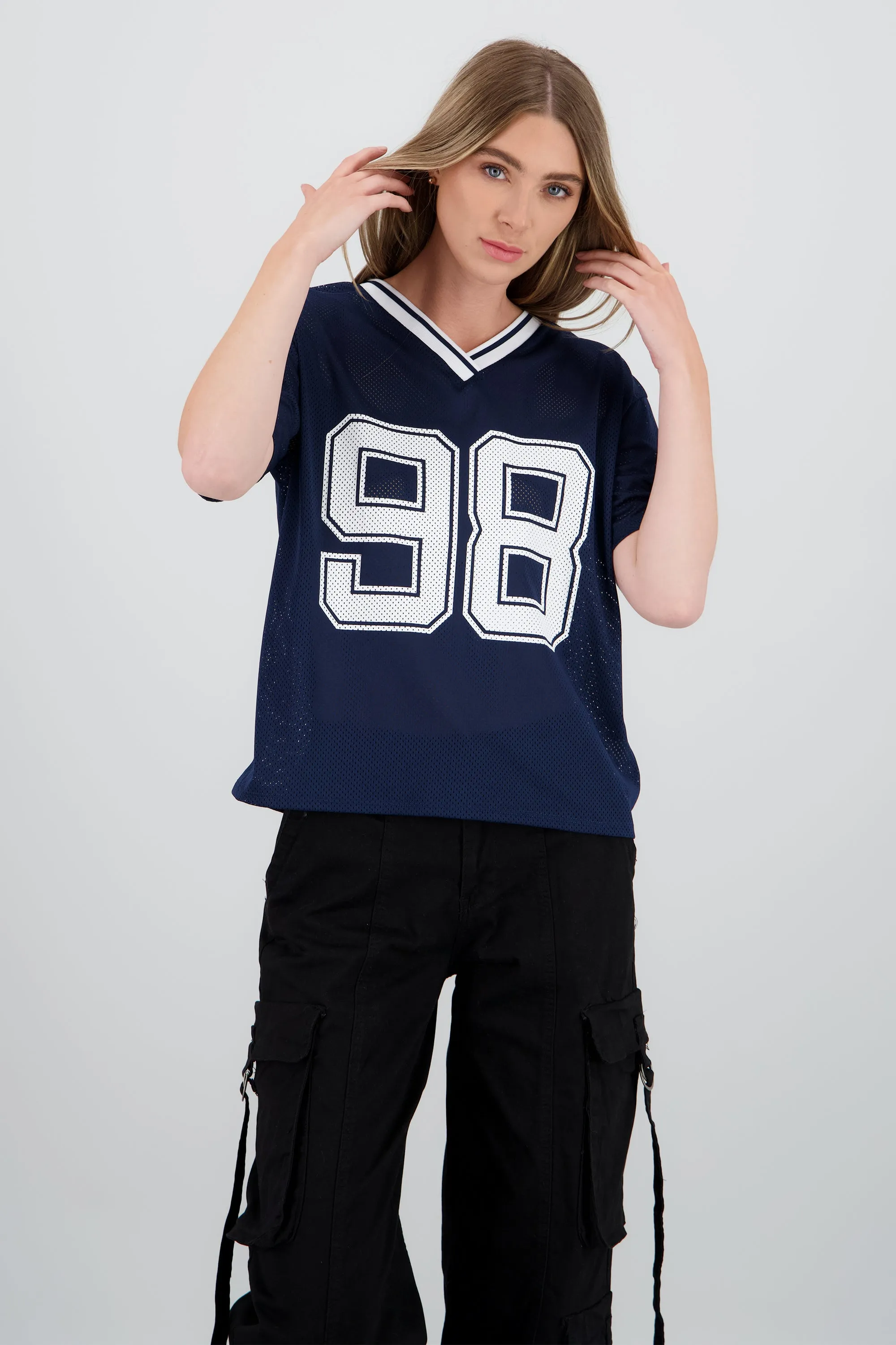 Playera over estampado numero sold by Shasa