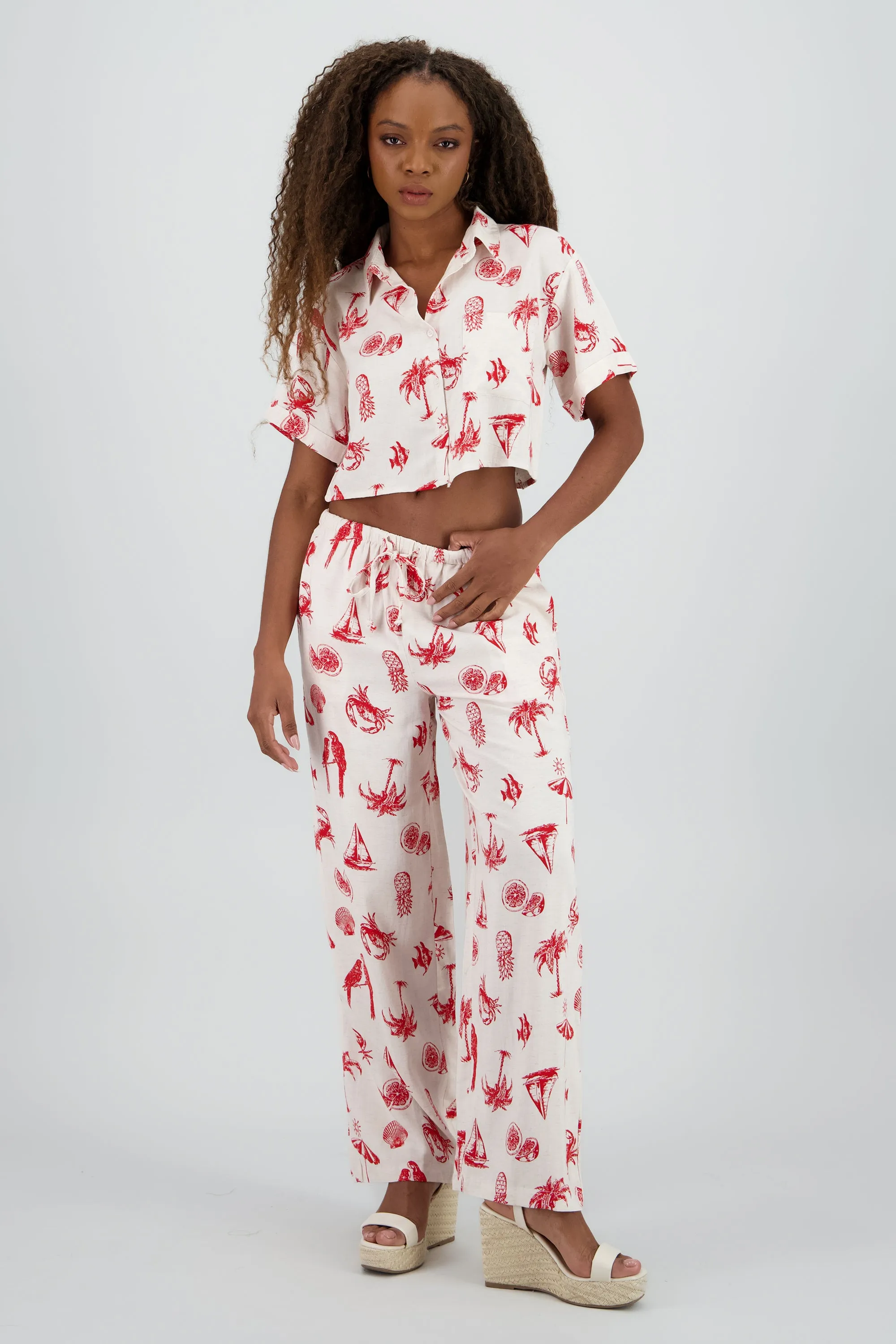 Pantalon tropical con mini print sold by Shasa