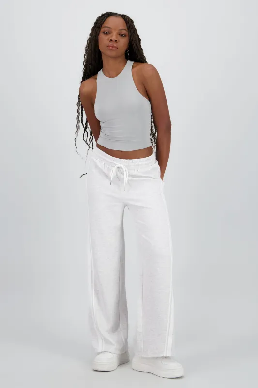 Pants con fleece y lineas contraste sold by Shasa