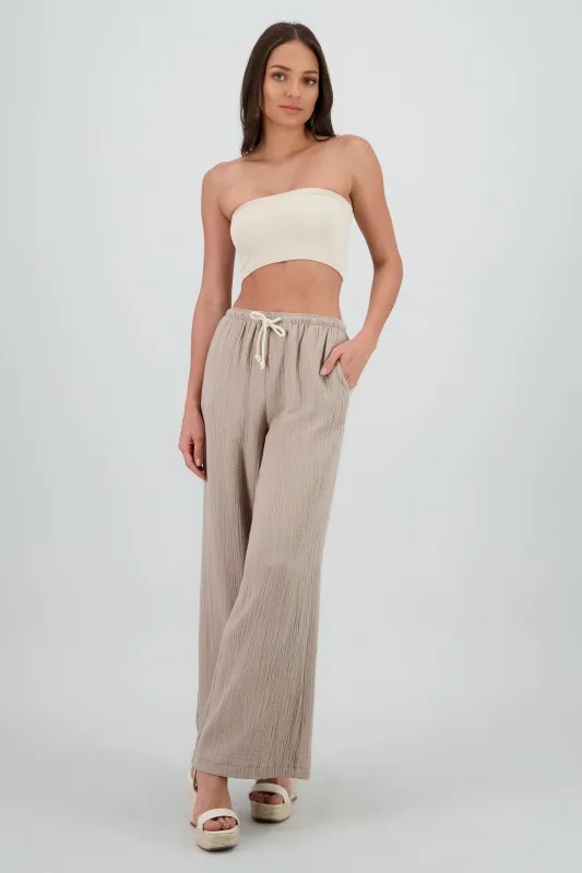 Pantalones fluidos textura sold by Shasa