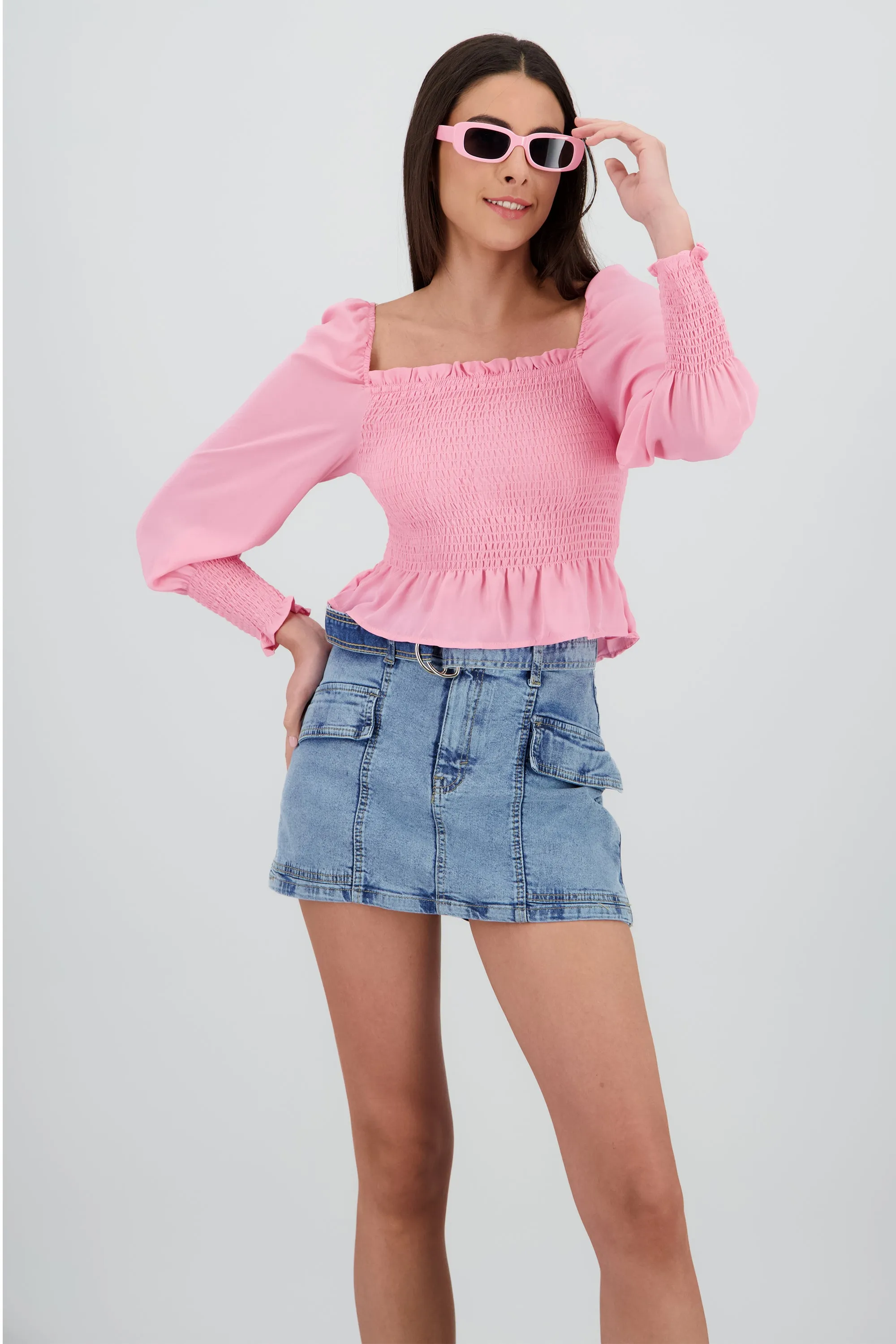 Top manga larga abullonada detalle smock sold by Shasa