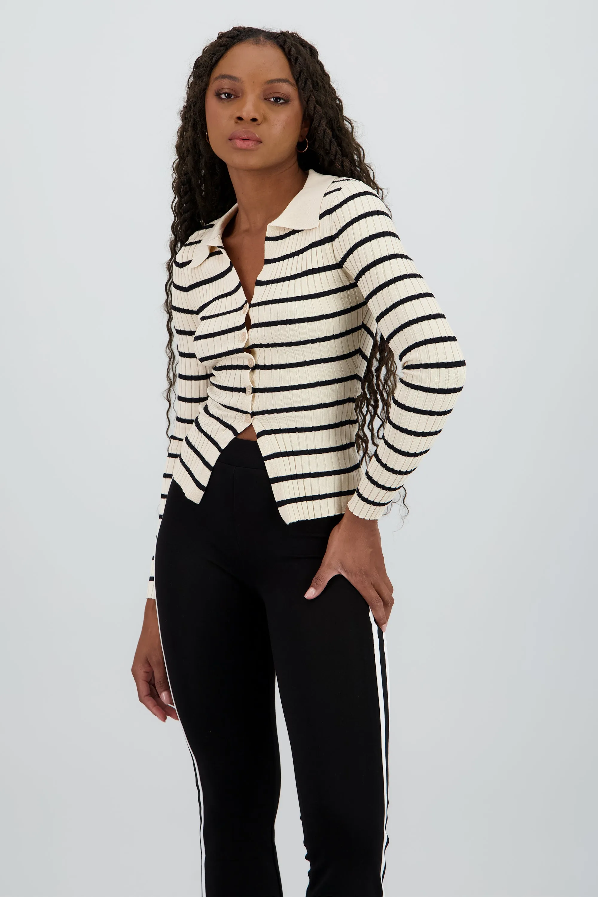 Top tejido rayas cuello polo sold by Shasa