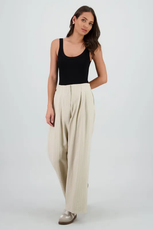 Pantalon fluido rayas sold by Shasa