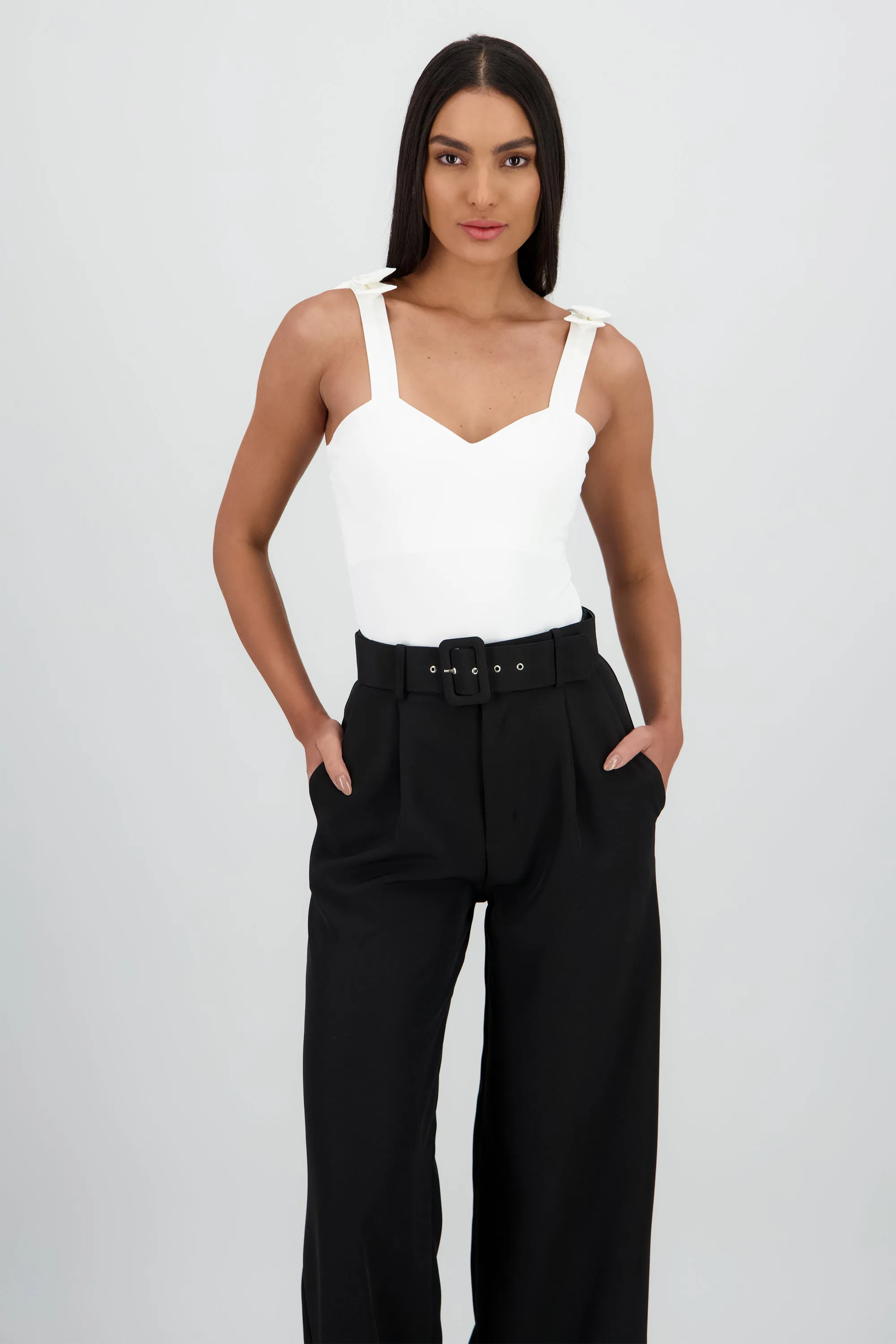 Bodysuit liso con tirante moños sold by Shasa