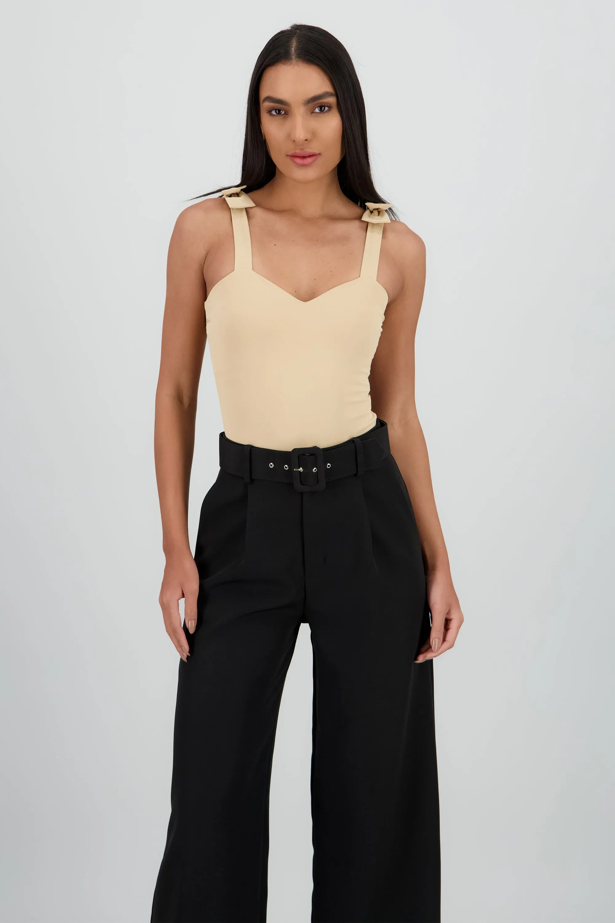 Bodysuit liso con tirante moños sold by Shasa