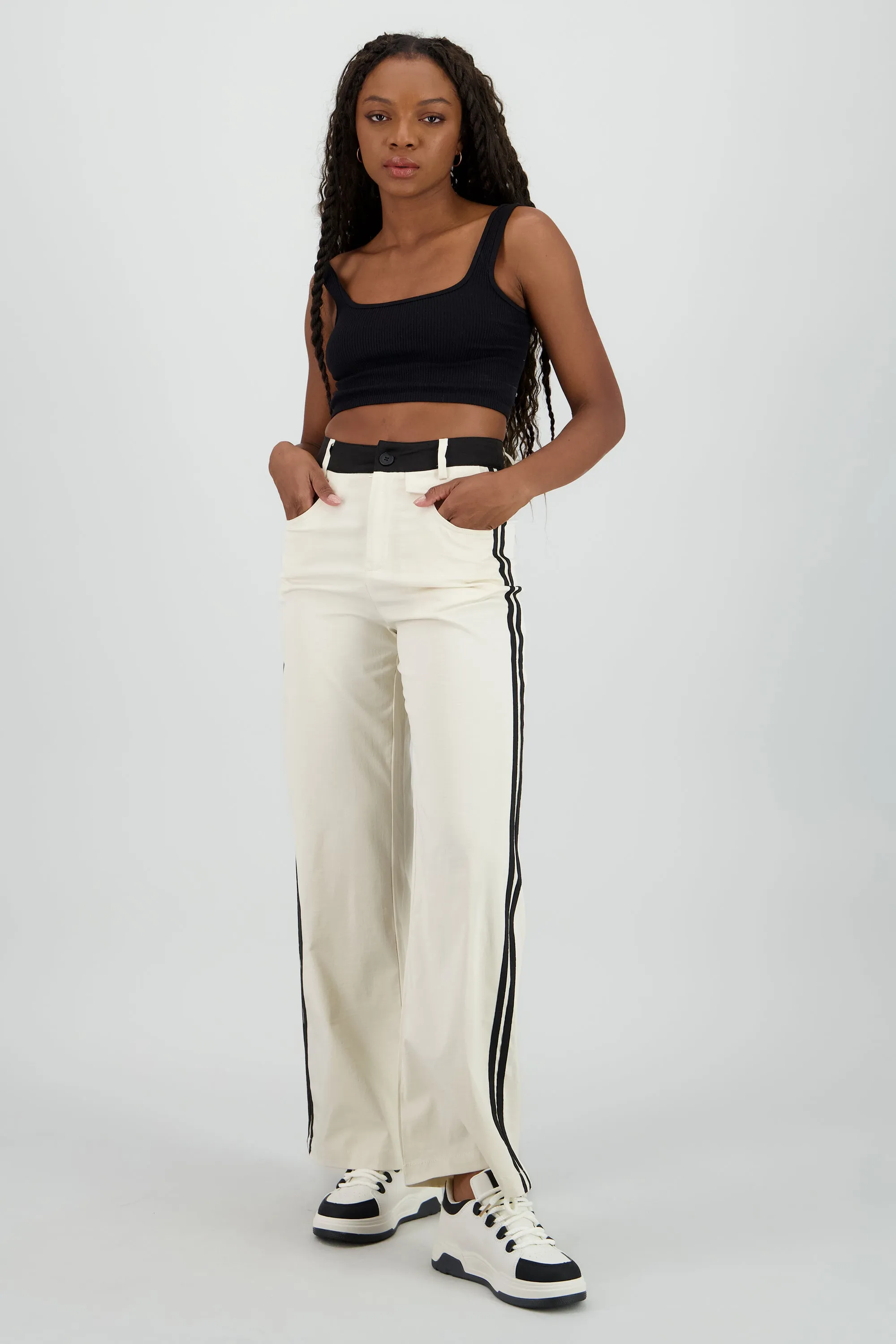 Pantalon fluido detalle contraste franja sold by Shasa