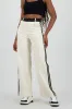 Pantalon fluido detalle contraste franja sold by Shasa