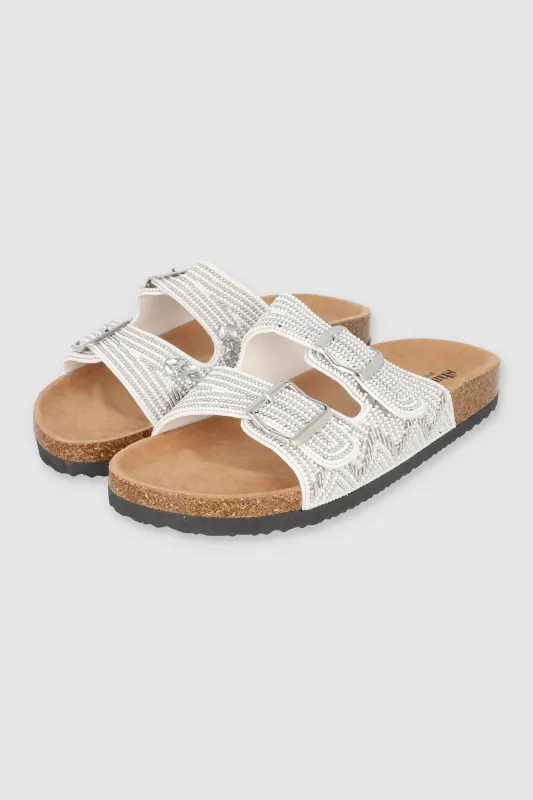 Sandalia dos tiras chaquiras sold by Shasa