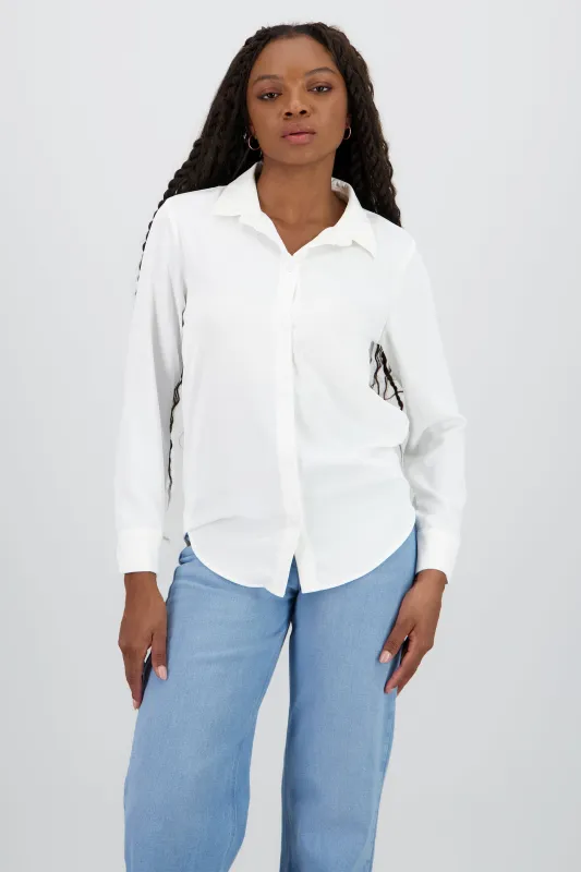 Camisa lisa manga larga botones sold by Shasa