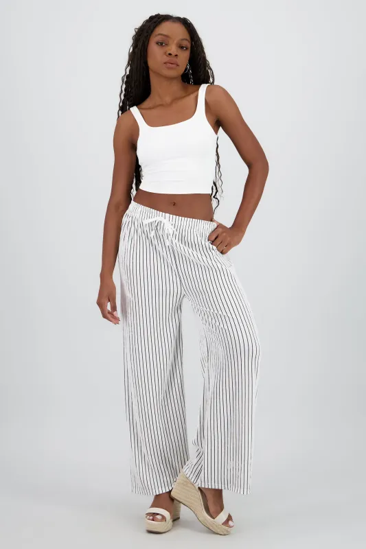 Pantalon rayas fluido sold by Shasa