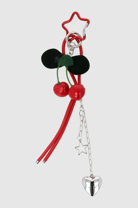 Charm cel cerezas corazon sold by Shasa