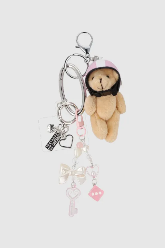 Charm cel multi oso casco moño sold by Shasa