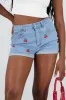 Short denim bordado de cerezas sold by Shasa