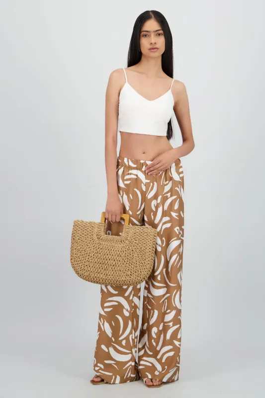 Pantalon amplio detalle resorte estampado figuras sold by Shasa