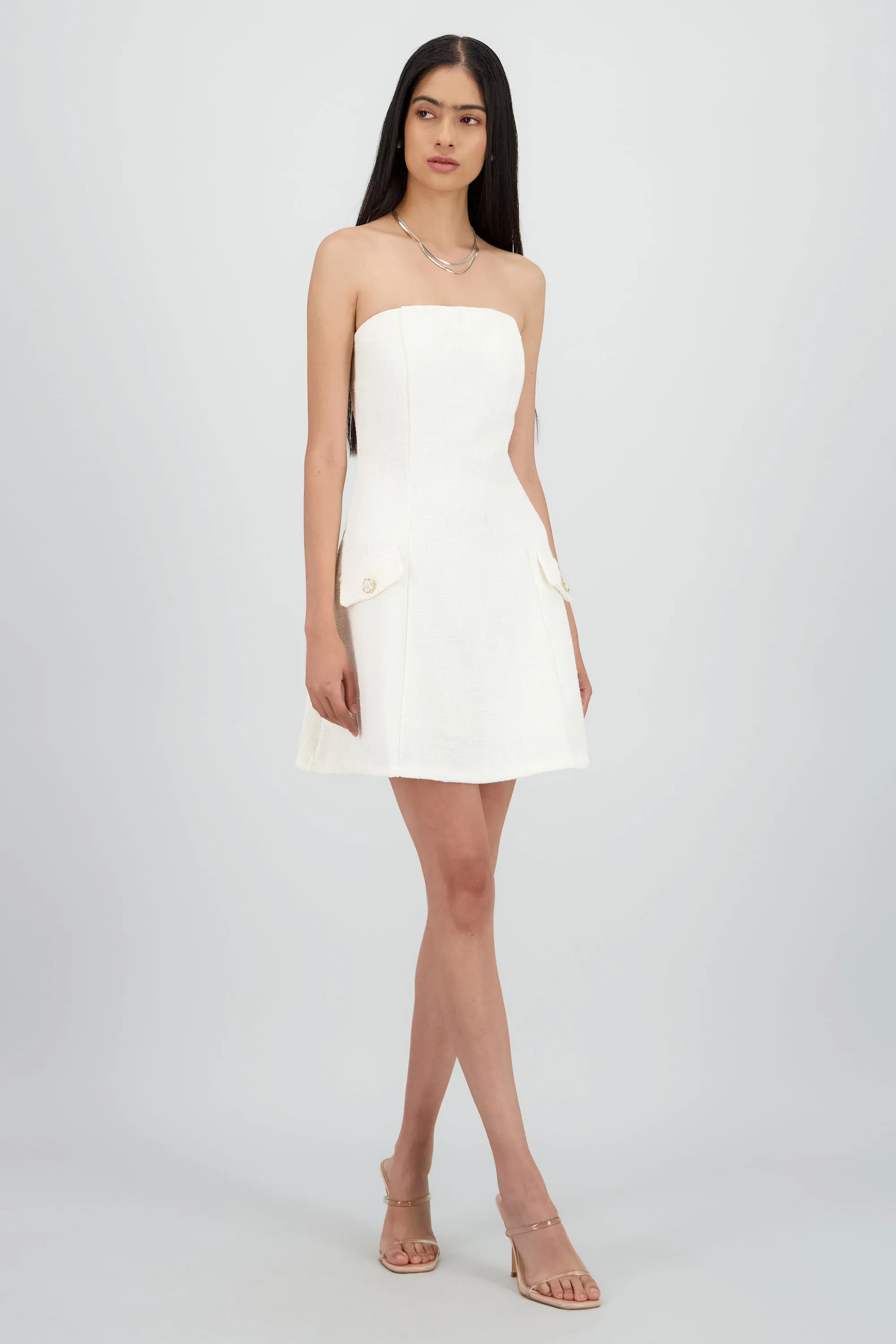 VESTIDO CON DETALLE DE FLOR sold by Shasa