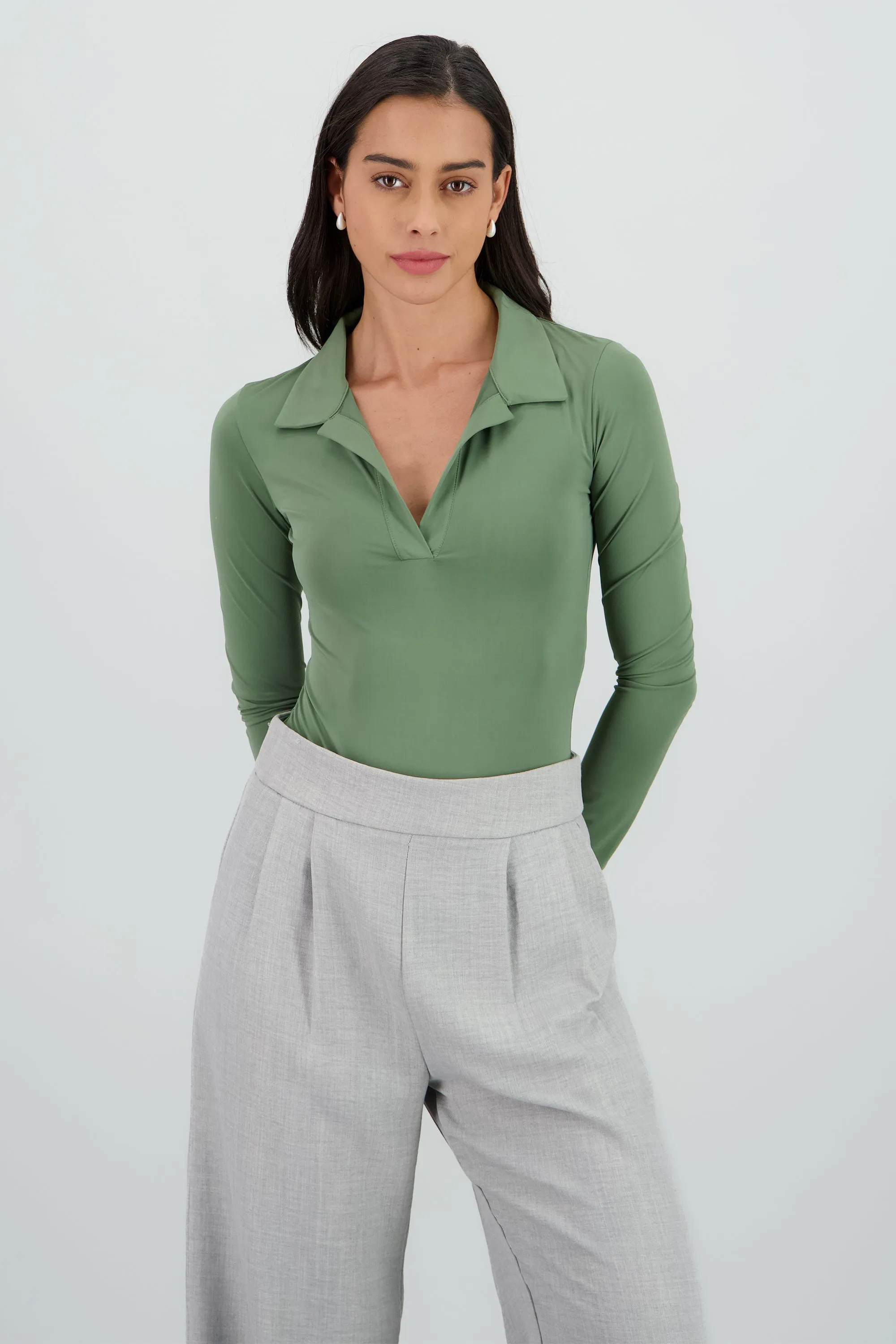 Body manga larga cuello polo sold by Shasa