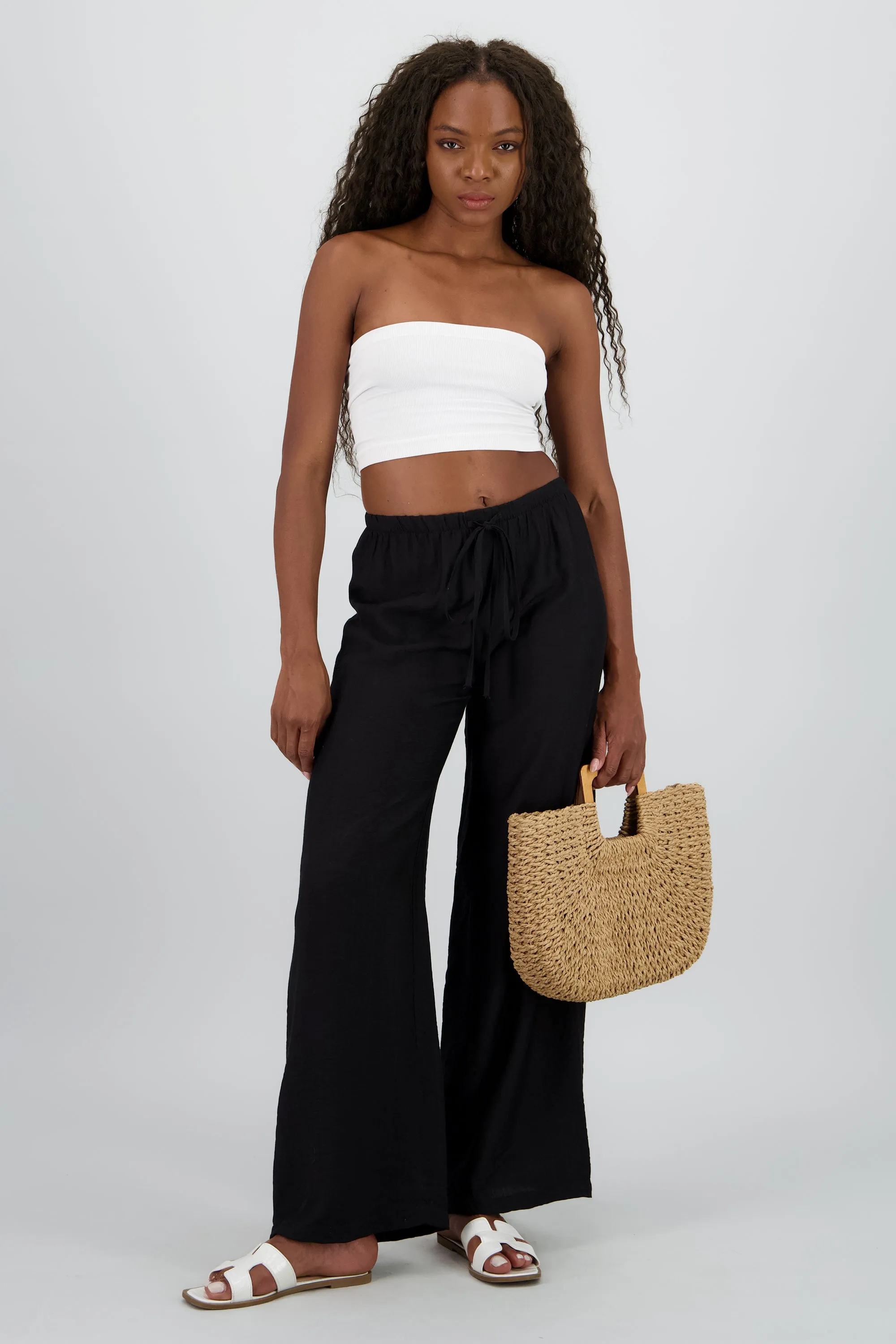 Pantalon wide leg fluido detalle resorte jareta sold by Shasa