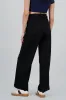 Pantalon liso detalle cinturon mini hevilla sold by Shasa