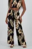 Pantalon con estampado tropical sold by Shasa
